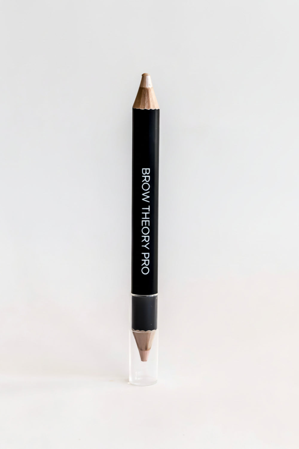 Brow Theory Pro Brow Highlighting Duo featuring a matte pink highlighter and champagne shimmer for defining and brightening the brows.